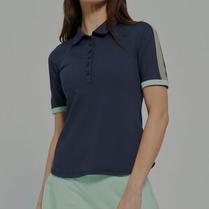 LIJA Nine Iron Polo. Navy. Size Small. New.This retro style golf polo has spor